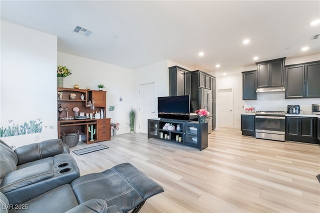 965 Nevada State Dr Unit 15104, Henderson, NV 89002 - living room with light wood-type flooring and recessed lighting