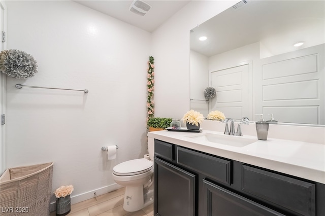965 Nevada State Dr Unit 15104, Henderson, NV 89002 - bathroom featuring toilet, baseboards, vanity, and recessed lighting
