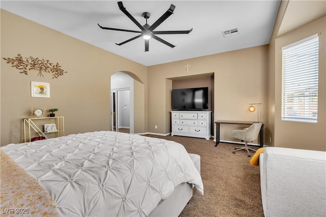 9362 Wilderness Glen Ave, Las Vegas, NV 89178 - bedroom with arched walkways, carpet, baseboards, and a ceiling fan