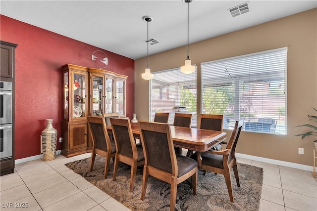 9362 Wilderness Glen Ave, Las Vegas, NV 89178 - dining area featuring light tile patterned flooring and baseboards