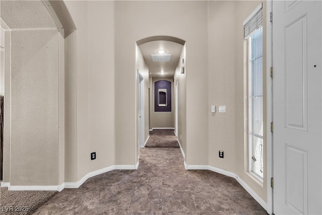 9362 Wilderness Glen Ave, Las Vegas, NV 89178 - corridor with arched walkways and baseboards
