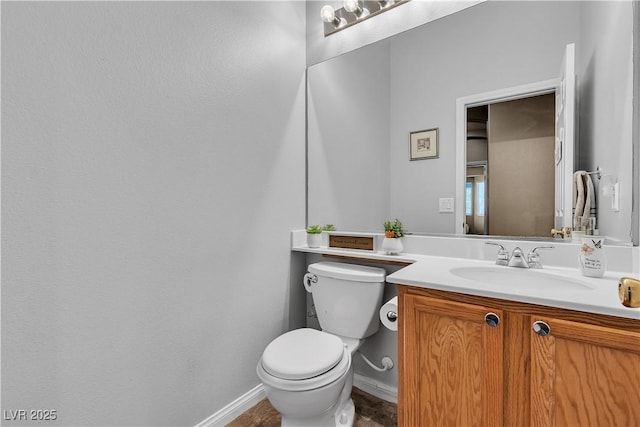 9362 Wilderness Glen Ave, Las Vegas, NV 89178 - half bath featuring toilet, vanity, and baseboards