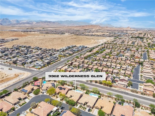 9362 Wilderness Glen Ave, Las Vegas, NV 89178 - aerial view of property's location with nearby suburban area and a mountain backdrop