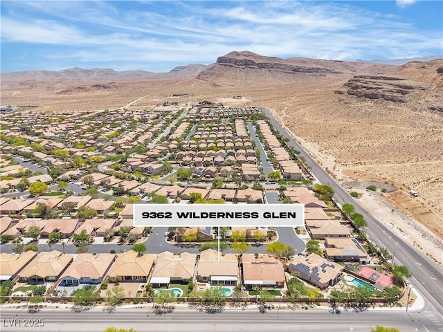 9362 Wilderness Glen Ave, Las Vegas, NV 89178 - aerial view of residential area with a mountain backdrop