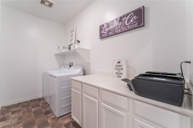 7107 Calvert Cliffs St, North Las Vegas, NV 89084 - washroom featuring independent washer and dryer, cabinet space, stone finish flooring, and baseboards