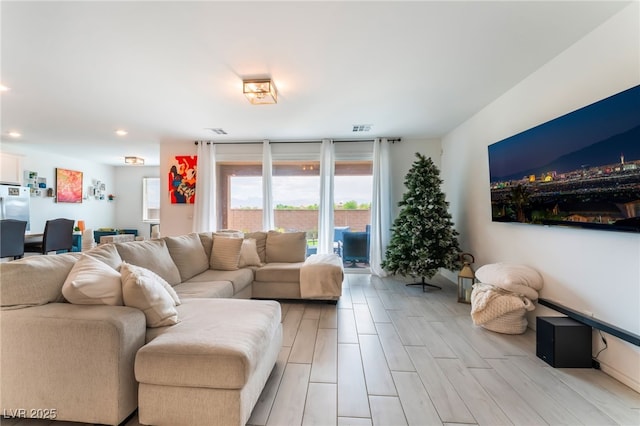 7107 Calvert Cliffs St, North Las Vegas, NV 89084 - living room with recessed lighting and light wood finished floors