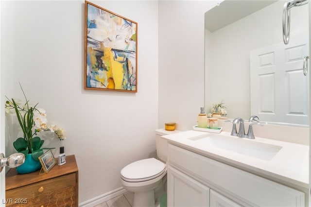 7107 Calvert Cliffs St, North Las Vegas, NV 89084 - half bath featuring vanity, toilet, tile patterned floors, and baseboards