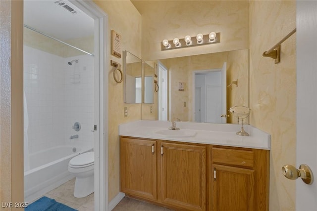 2147 Bridle Wreath Ln, Las Vegas, NV 89156 - bathroom featuring vanity, toilet, tile patterned flooring, and shower / bathtub combination