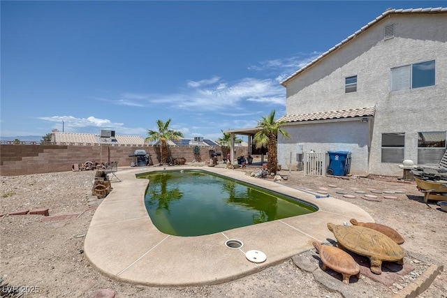 2147 Bridle Wreath Ln, Las Vegas, NV 89156 - view of swimming pool with a fenced backyard and a patio area