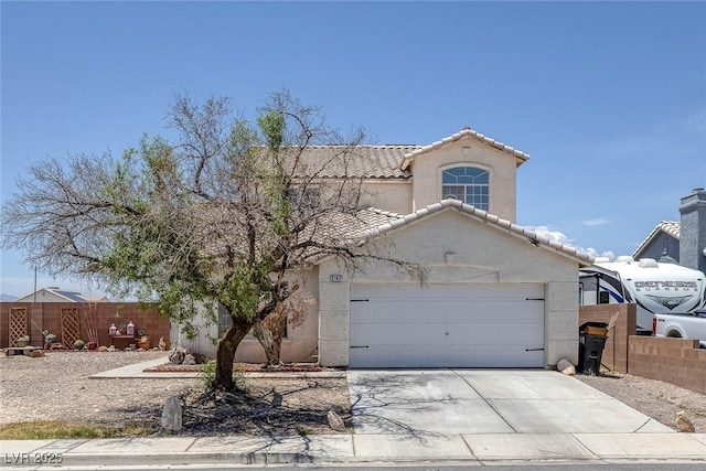 2147 Bridle Wreath Ln, Las Vegas, NV 89156 - mediterranean / spanish-style home with driveway, stucco siding, a tiled roof, and an attached garage