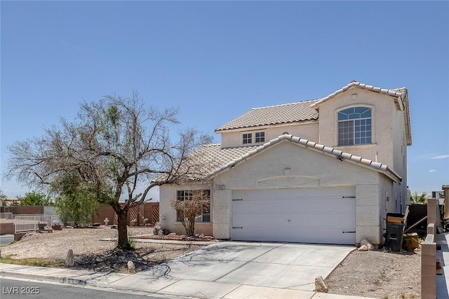 2147 Bridle Wreath Ln, Las Vegas, NV 89156 - mediterranean / spanish house with a tile roof, stucco siding, concrete driveway, and an attached garage
