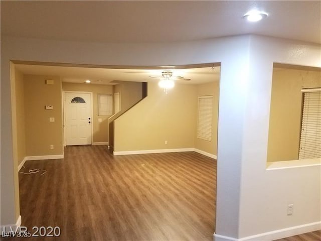 8982 Leaping Pad Ct, Las Vegas, NV 89148 - unfurnished living room featuring wood finished floors, baseboards, and recessed lighting