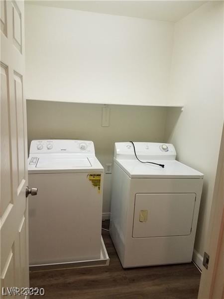8982 Leaping Pad Ct, Las Vegas, NV 89148 - washroom featuring independent washer and dryer and wood finished floors