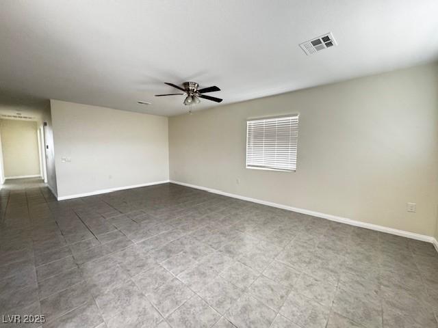 4189 Studio St, Las Vegas, NV 89115 - spare room featuring a ceiling fan and baseboards