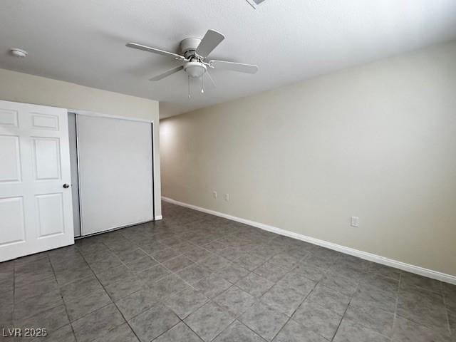 4189 Studio St, Las Vegas, NV 89115 - unfurnished bedroom featuring a closet, baseboards, and a ceiling fan