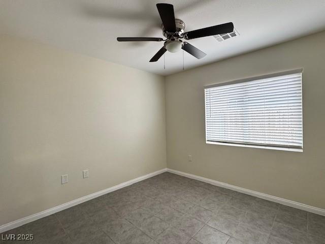 4189 Studio St, Las Vegas, NV 89115 - spare room featuring a ceiling fan and baseboards