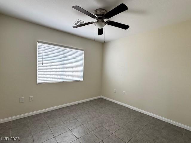 4189 Studio St, Las Vegas, NV 89115 - empty room featuring a ceiling fan and baseboards