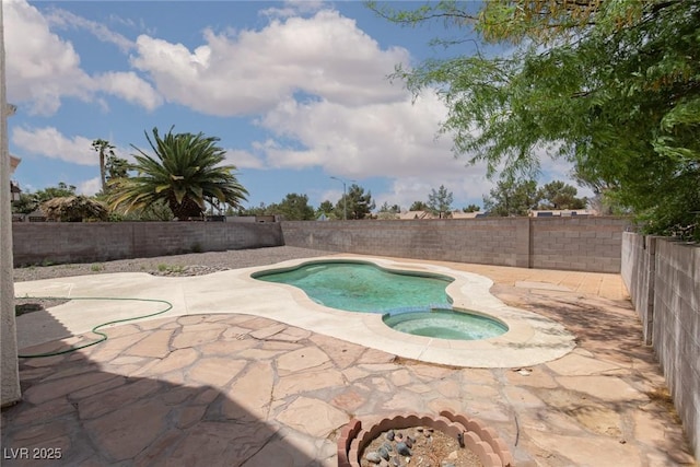 1924 Coralino Dr, Henderson, NV 89074 - view of pool with a patio area, a fenced backyard, and a pool with connected hot tub