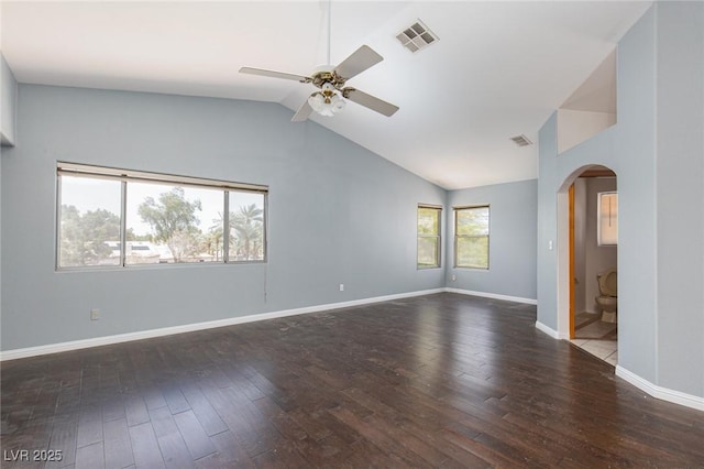 1924 Coralino Dr, Henderson, NV 89074 - empty room with arched walkways, ceiling fan, hardwood / wood-style flooring, vaulted ceiling, and baseboards
