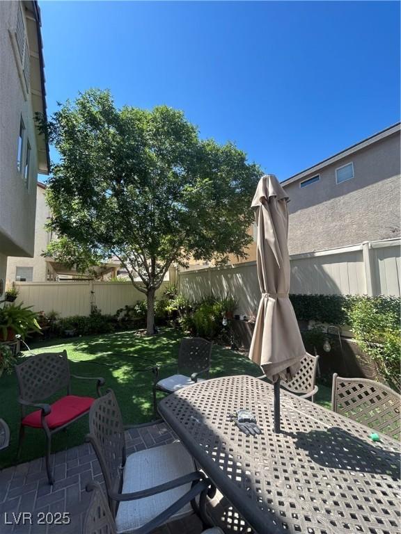 9082 Amanda Creek Ct, Las Vegas, NV 89149 - view of patio featuring outdoor dining space