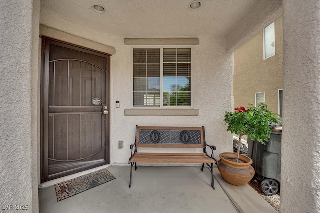 9082 Amanda Creek Ct, Las Vegas, NV 89149 - property entrance featuring stucco siding and covered porch