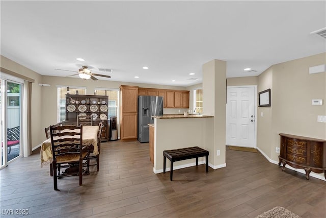 9082 Amanda Creek Ct, Las Vegas, NV 89149 - dining area featuring dark wood-style flooring, healthy amount of natural light, recessed lighting, a ceiling fan, and baseboards