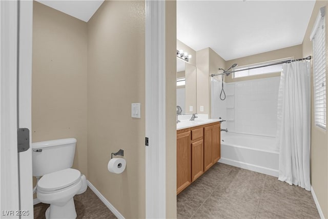 9082 Amanda Creek Ct, Las Vegas, NV 89149 - full bath featuring toilet, vanity, shower / bathtub combination with curtain, baseboards, and tile patterned flooring