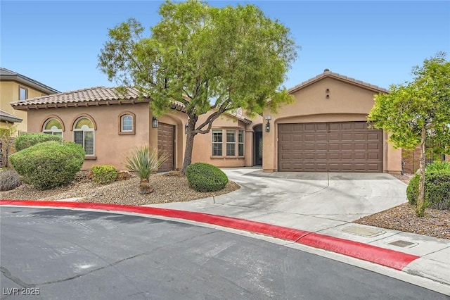 7404 Eggshell Dr, North Las Vegas, NV 89084 - mediterranean / spanish home with driveway, a garage, stucco siding, and a tiled roof