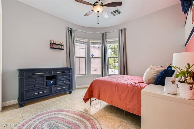 7404 Eggshell Dr, North Las Vegas, NV 89084 - bedroom featuring baseboards, light tile patterned floors, and a ceiling fan