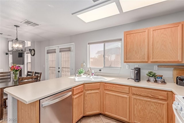 7912 Horn Beam Ct, Las Vegas, NV 89131 - kitchen featuring stainless steel dishwasher, a sink, a peninsula, range, and light brown cabinetry