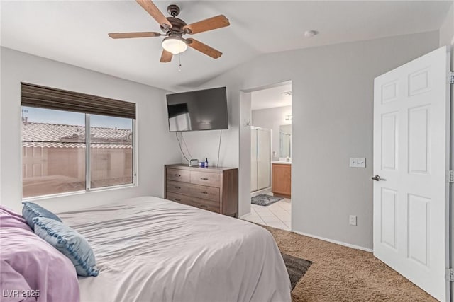7912 Horn Beam Ct, Las Vegas, NV 89131 - bedroom featuring vaulted ceiling, light colored carpet, ceiling fan, ensuite bathroom, and baseboards