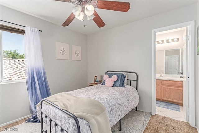 7912 Horn Beam Ct, Las Vegas, NV 89131 - bedroom with ensuite bathroom, light carpet, and ceiling fan