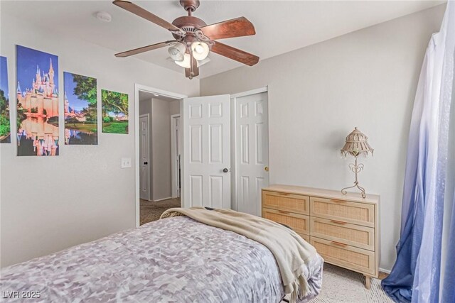 7912 Horn Beam Ct, Las Vegas, NV 89131 - bedroom with light carpet, a ceiling fan, and a closet