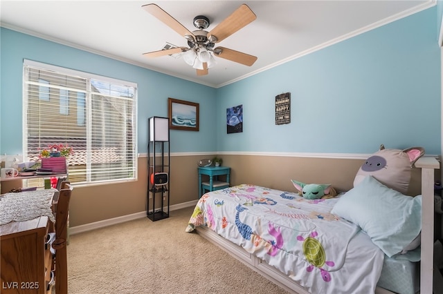 bedroom with carpet, baseboards, crown molding, and a ceiling fan