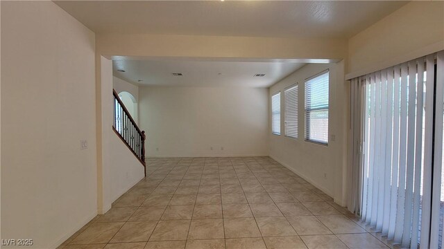 386 Botanic Gardens Dr, Las Vegas, NV 89148 - spare room featuring light tile patterned floors and baseboards