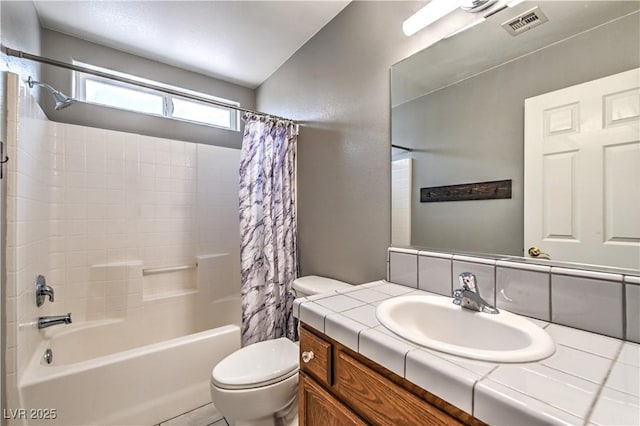bathroom with toilet, shower / bathtub combination with curtain, and vanity