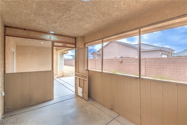 view of unfurnished sunroom