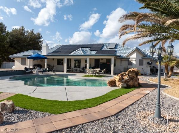 1251 Cavalry St, Pahrump, NV 89048 - swimming pool with a patio area