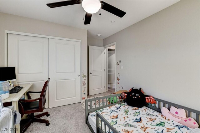 5236 Sunstone Mesa Dr, Las Vegas, NV 89166 - bedroom featuring light colored carpet, a closet, an office area, and a ceiling fan