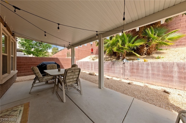 10440 Bay Ginger Ln, Las Vegas, NV 89135 - view of patio / terrace with outdoor dining area and a fenced backyard