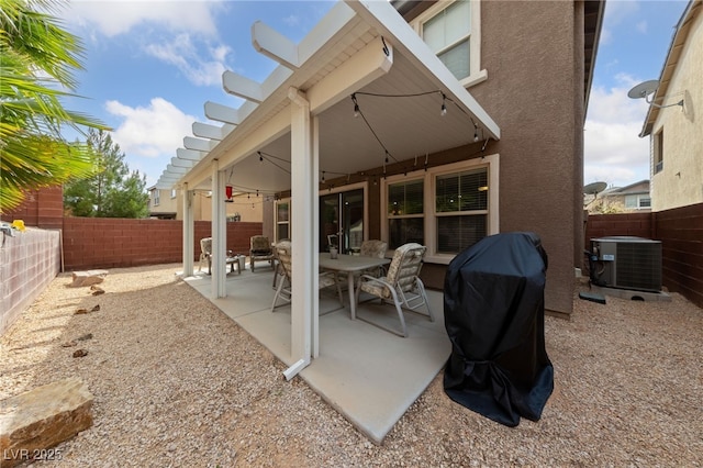 10440 Bay Ginger Ln, Las Vegas, NV 89135 - view of patio / terrace with central AC unit, a fenced backyard, and grilling area