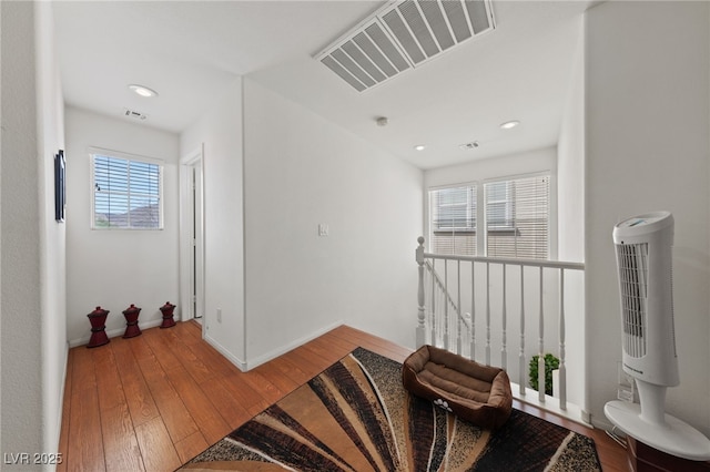 10440 Bay Ginger Ln, Las Vegas, NV 89135 - hall with plenty of natural light, hardwood / wood-style floors, baseboards, and recessed lighting