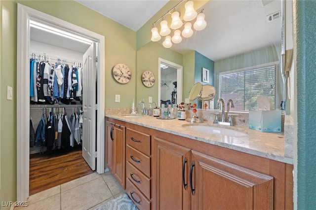 10440 Bay Ginger Ln, Las Vegas, NV 89135 - full bath featuring tile patterned flooring, a walk in closet, and double vanity