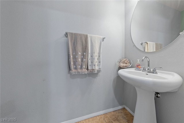 10440 Bay Ginger Ln, Las Vegas, NV 89135 - bathroom featuring baseboards and a sink