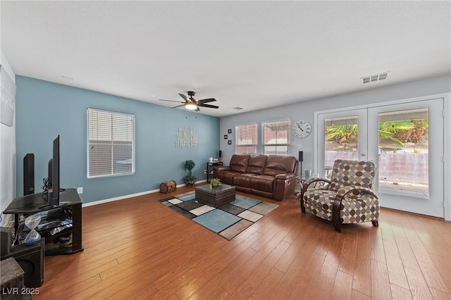 10440 Bay Ginger Ln, Las Vegas, NV 89135 - living room with a ceiling fan, hardwood / wood-style flooring, french doors, and baseboards