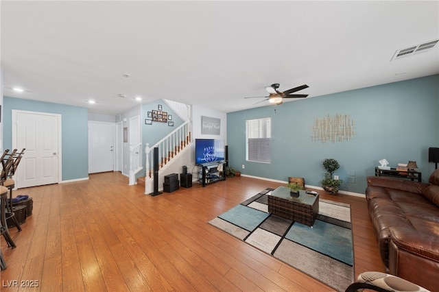 10440 Bay Ginger Ln, Las Vegas, NV 89135 - living area featuring stairway, a ceiling fan, recessed lighting, light wood finished floors, and baseboards