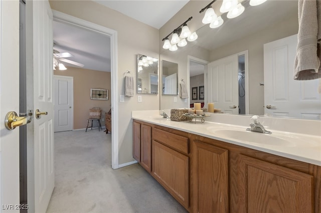 6999 Stone Meadows Ave, Las Vegas, NV 89142 - bathroom featuring double vanity, ceiling fan, and baseboards