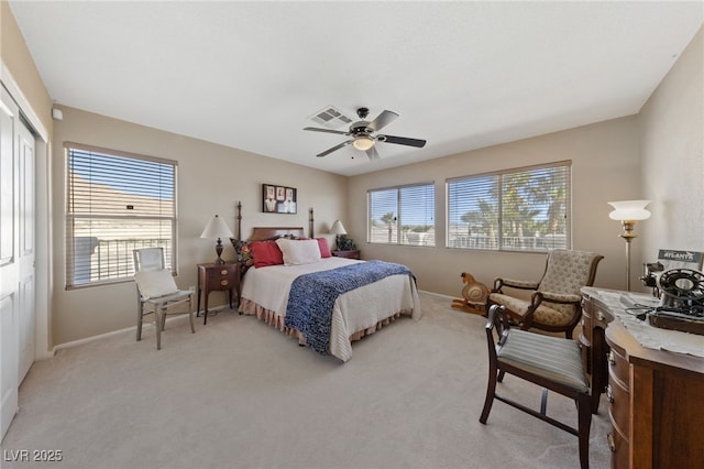 6999 Stone Meadows Ave, Las Vegas, NV 89142 - bedroom featuring multiple windows, light carpet, a closet, and baseboards