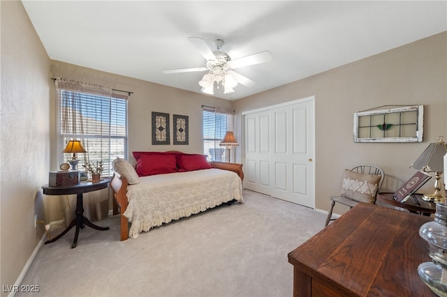 6999 Stone Meadows Ave, Las Vegas, NV 89142 - bedroom with carpet flooring, baseboards, a closet, and ceiling fan