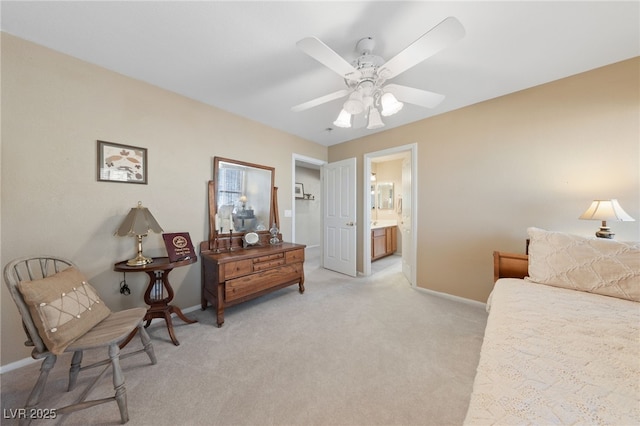 6999 Stone Meadows Ave, Las Vegas, NV 89142 - bedroom featuring baseboards, light carpet, connected bathroom, and a ceiling fan